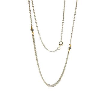 Elegant halskæde i rhodium/guld med mørke diamanter og facetteret glitrende kæde.