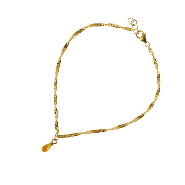 Elegant guldfarvet armbånd med snoet kæde, dråbeformet citrin og justerbar forlængerkæde.